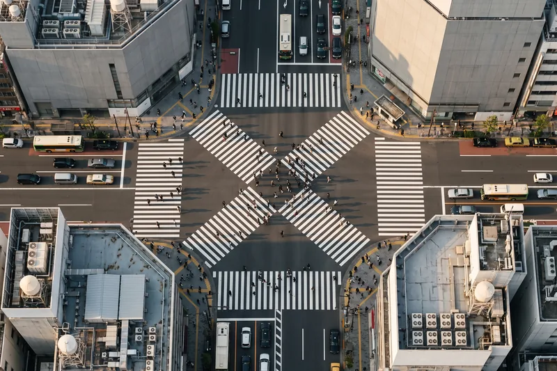 AI-generated — a scramble crossing from above