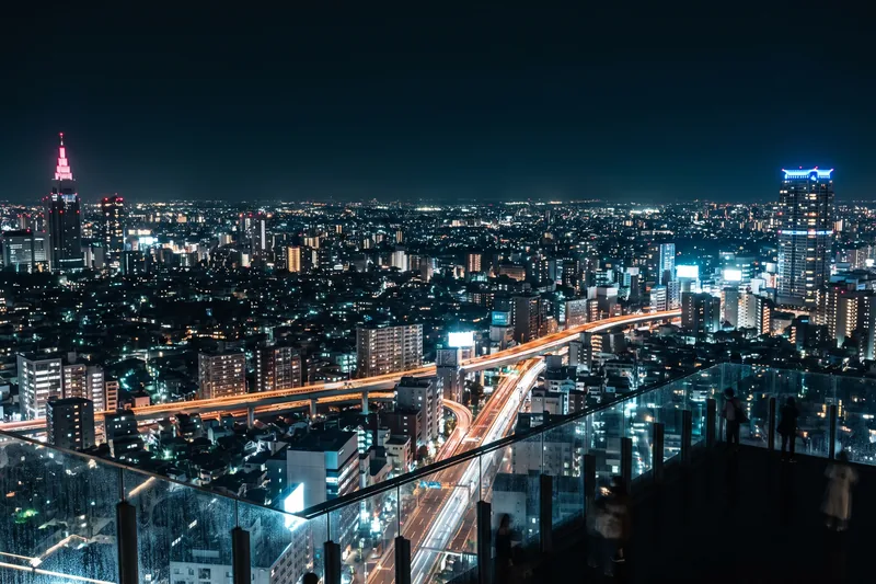 AI-generated — the city lit after dark